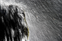 Sunlight captures the spray at Catrake Force, Keld, North Yorkshire, England